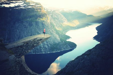 Woman on a cliff in Norway