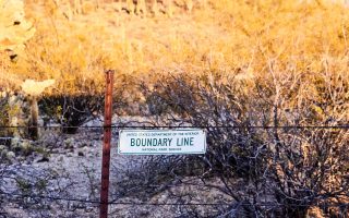A sign reading boundary line